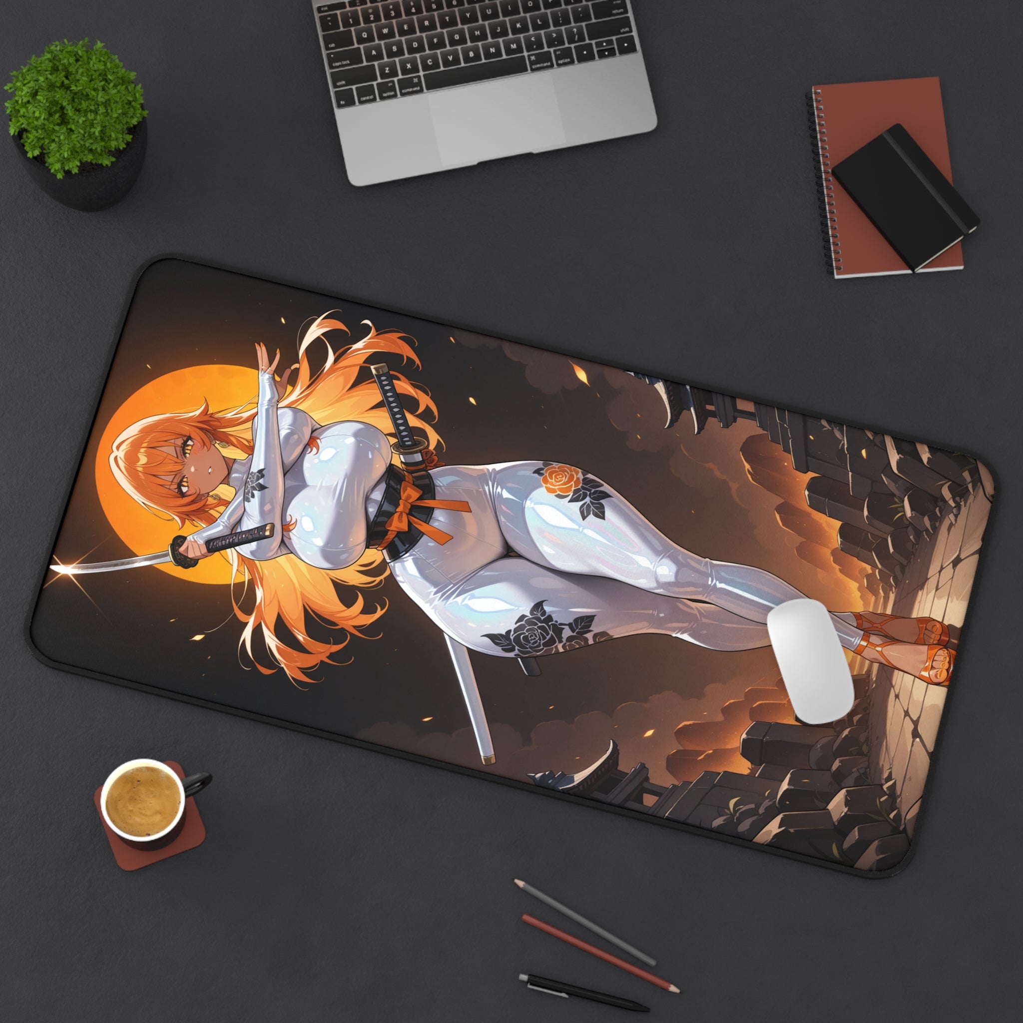 Desk setup with a large mouse pad featuring an anime-style design, laptop, coffee cup, and stationery items on a dark surface.