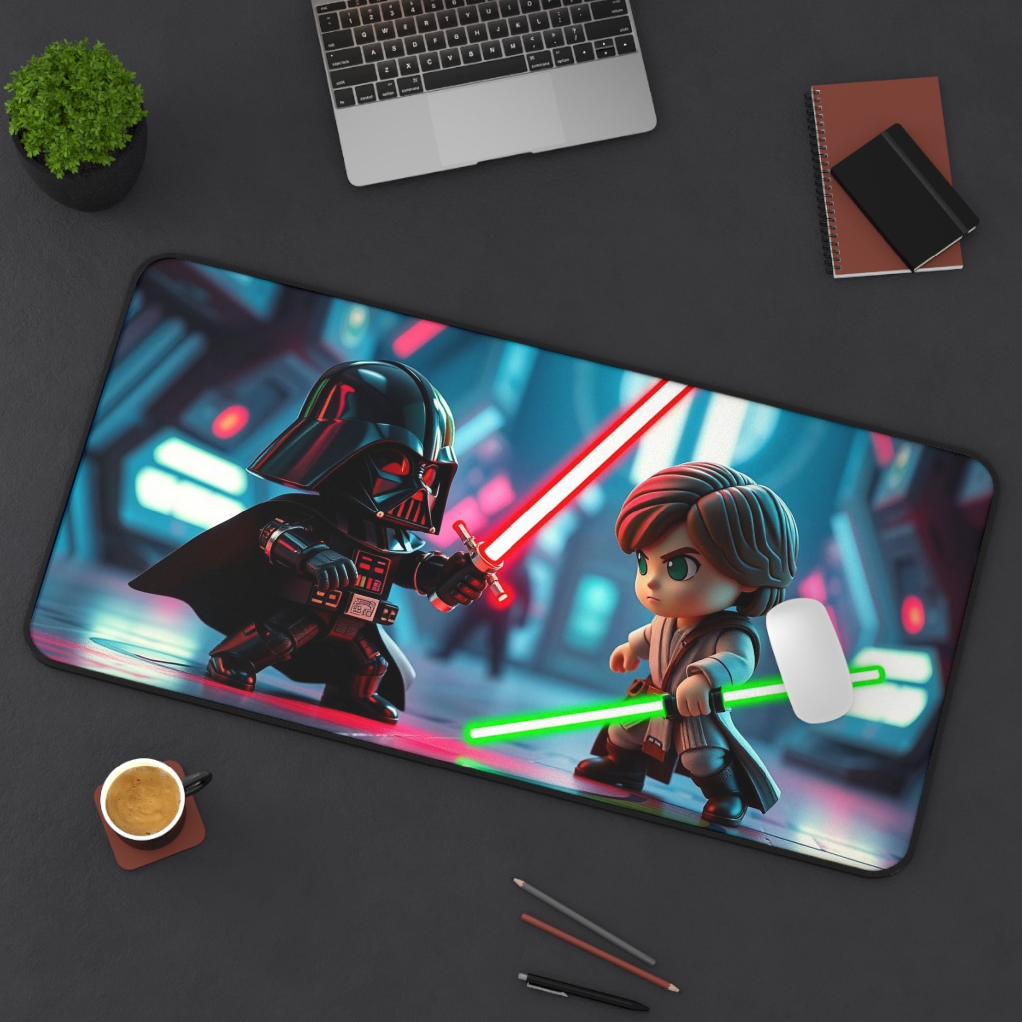 Desk setup with a large mouse pad featuring animated characters with lightsabers.