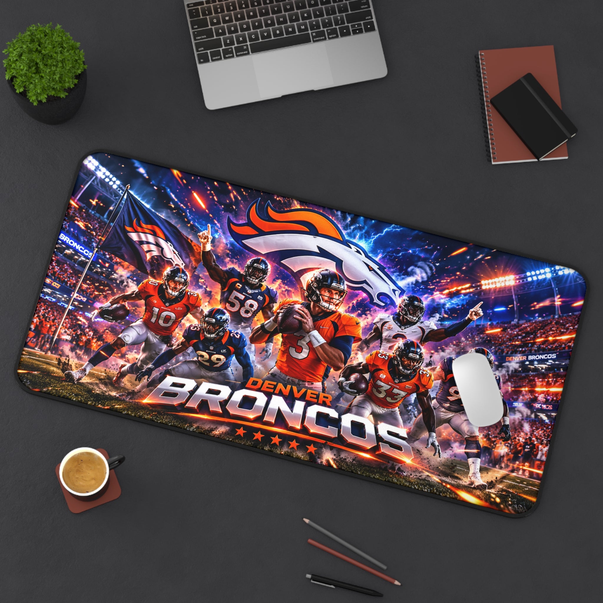 Denver Broncos-themed mouse pad on a desk with a laptop, coffee, and pencils.