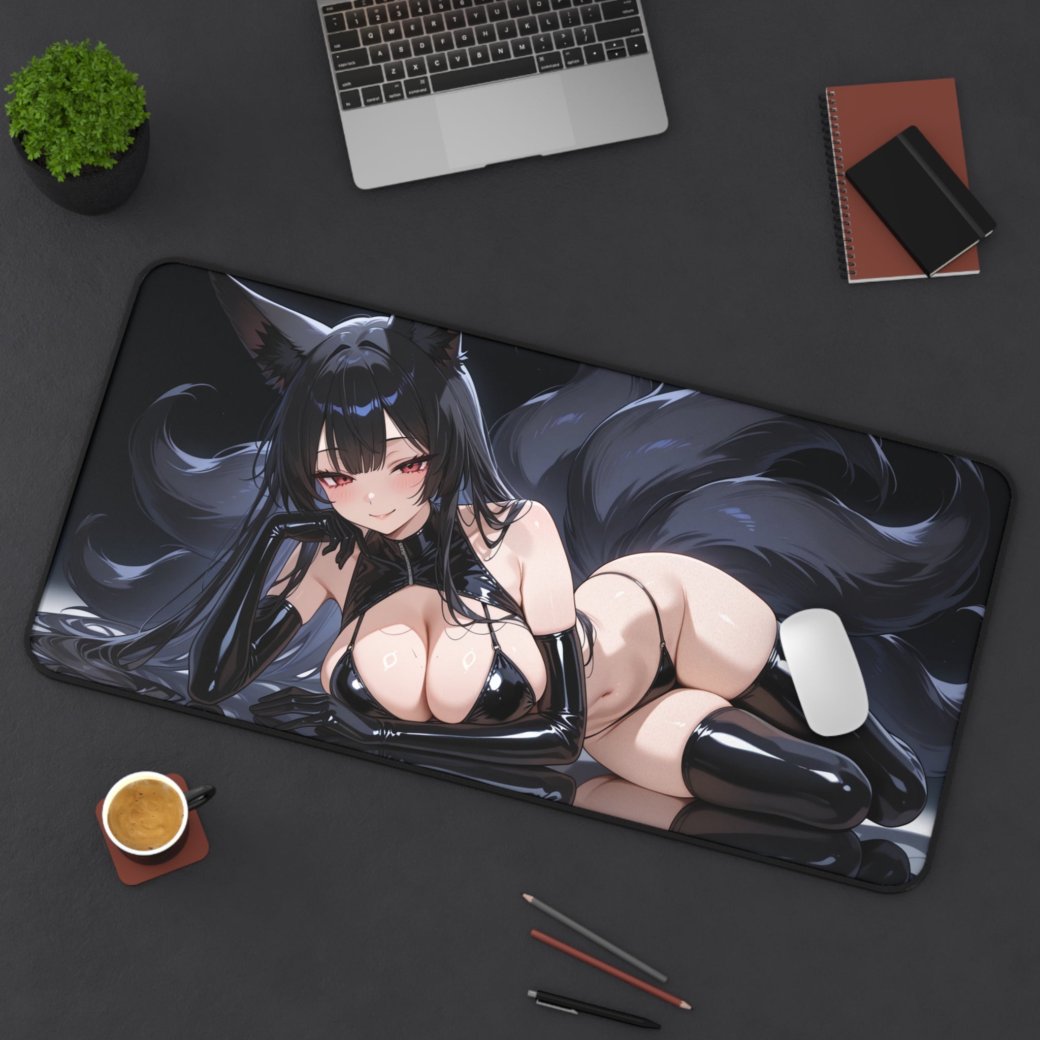 Anime-style mouse pad with character design on a desk with laptop and stationery items.