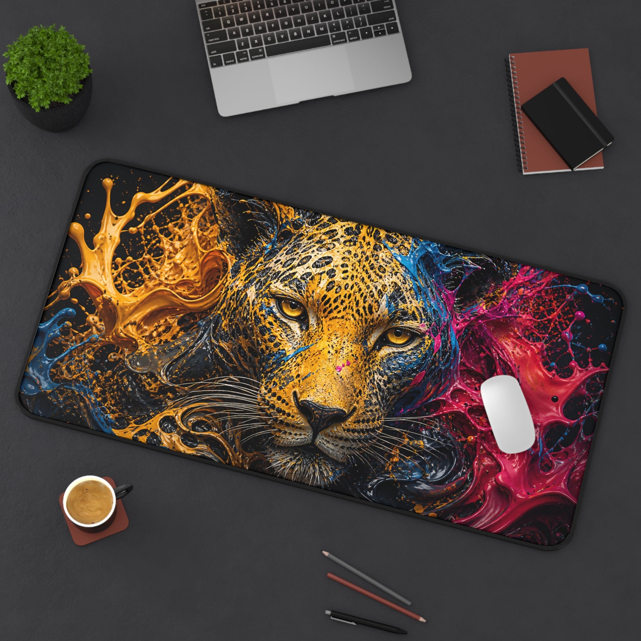 Colorful leopard design mouse pad on a desk with office items.