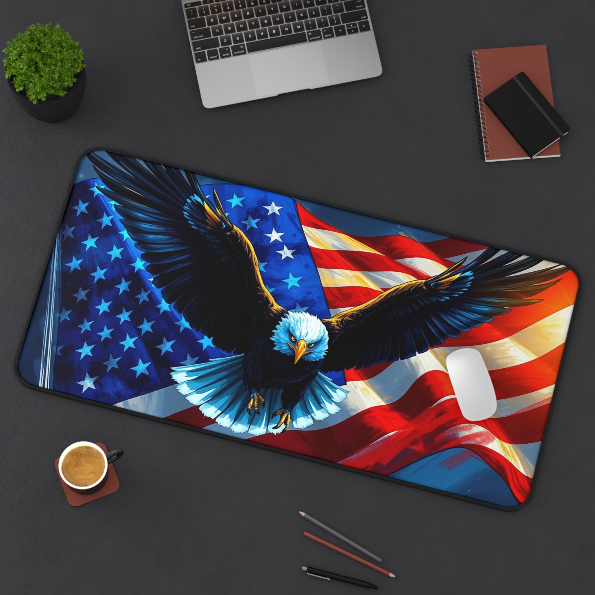 Desk setup with a large mouse pad featuring an American flag and eagle design, surrounded by office items.