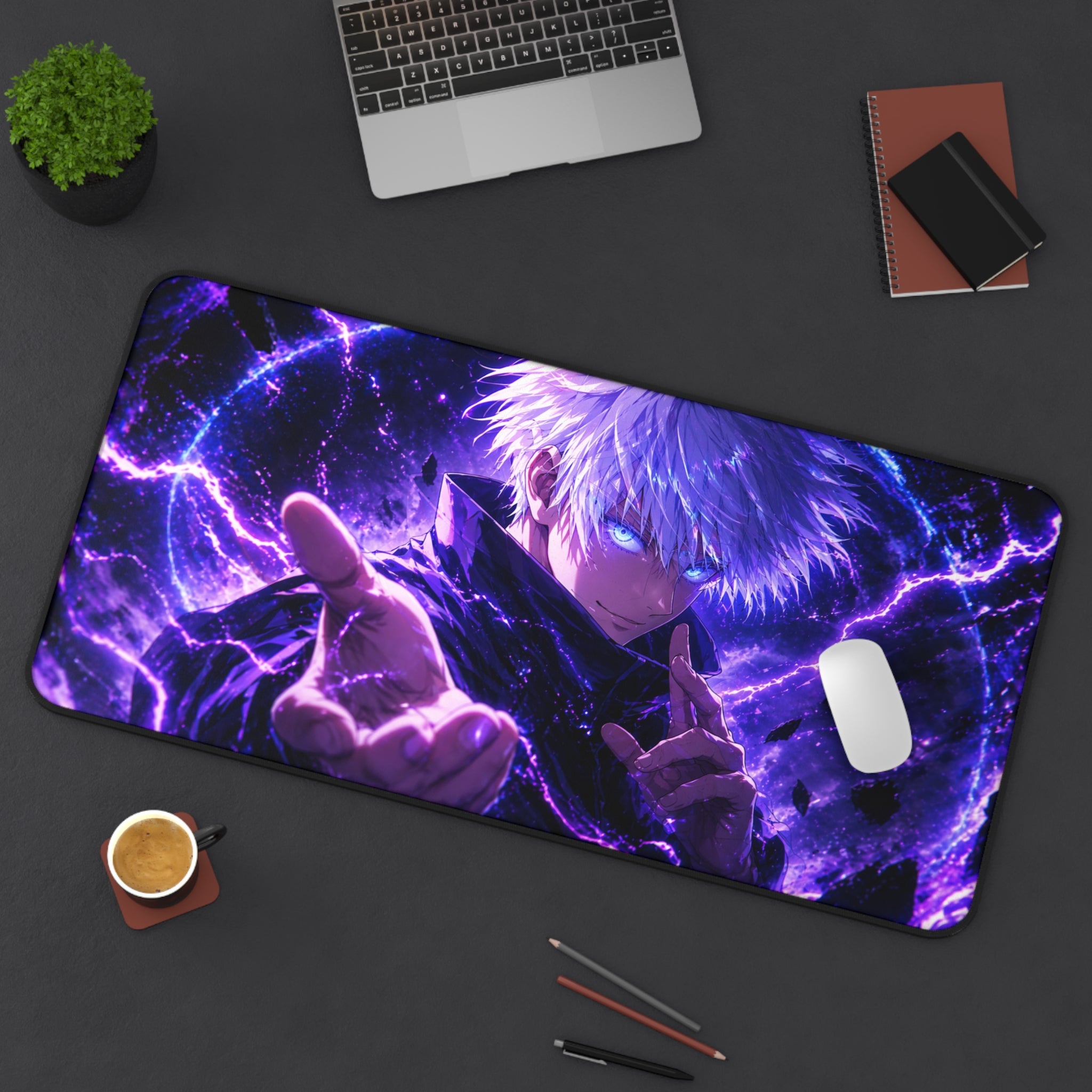 Desk setup with a large mouse pad featuring an anime character, laptop, coffee cup, and stationery items.