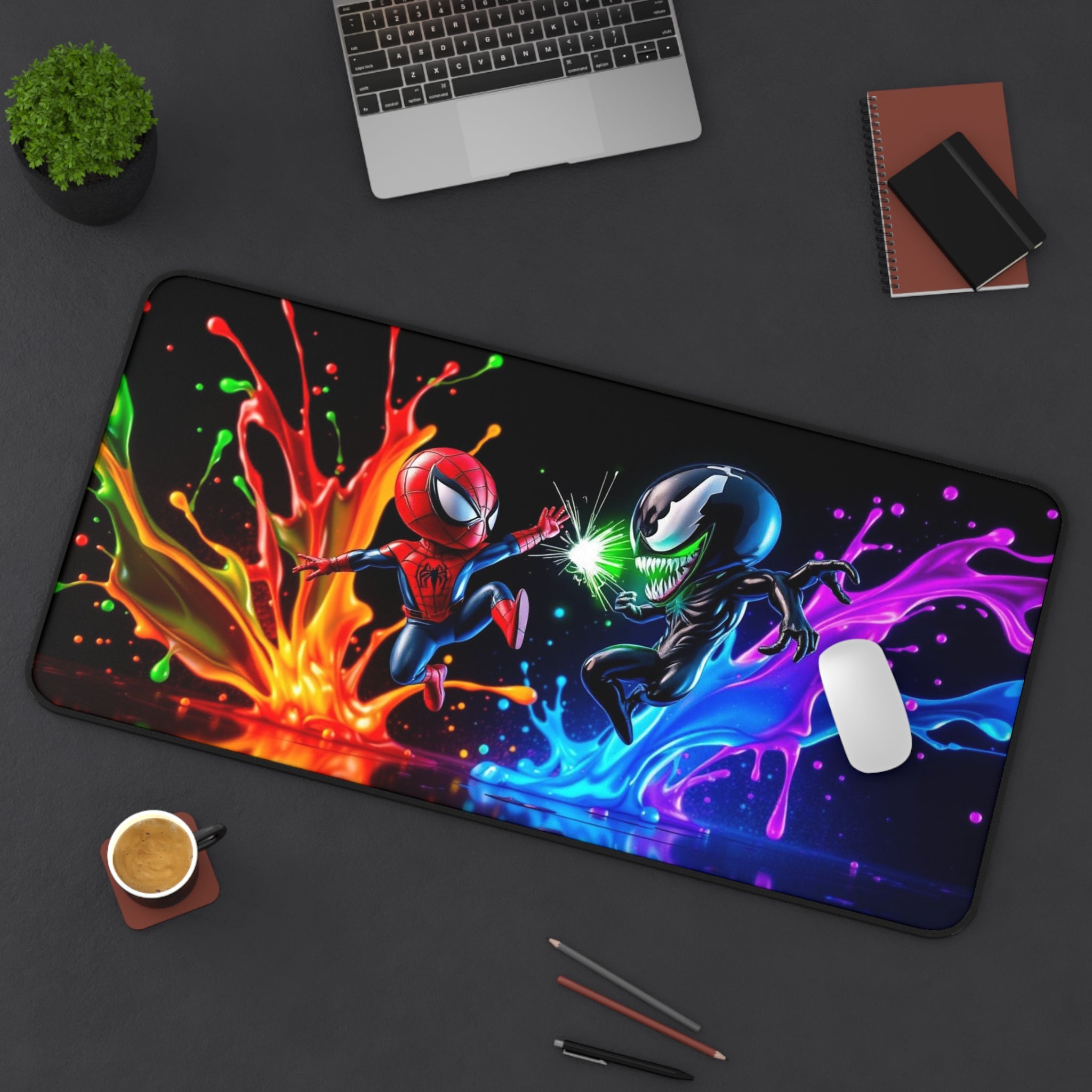 Colorful superhero-themed mouse pad on a desk with laptop, coffee, and stationery.